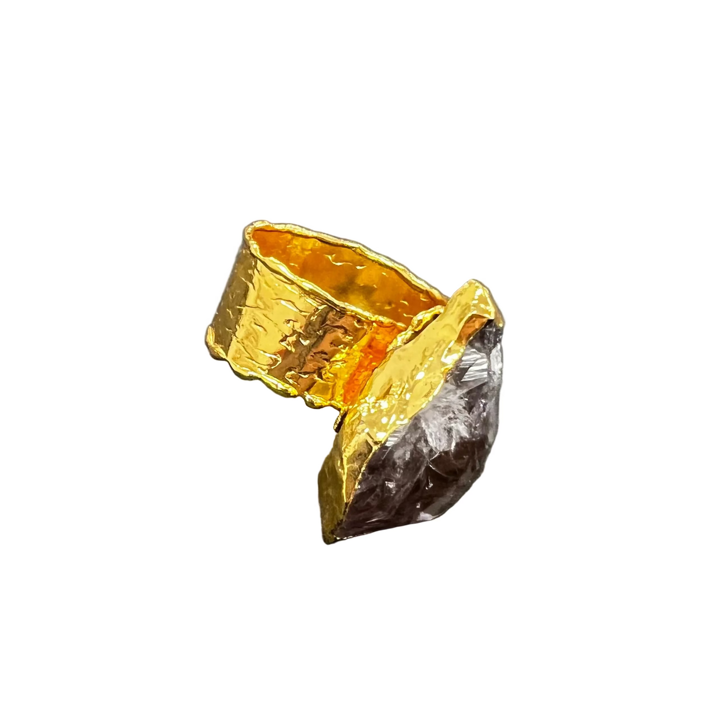 Gold ring with a amethyst stone on a gray background